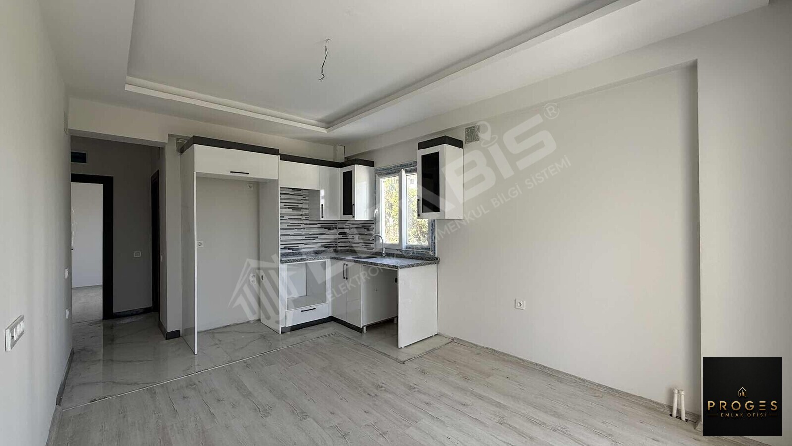 PROGES'TEN ARPAÇBAHŞİŞ'TE DENİZE YÜRÜME MESAFESİNDE 1+1 SATILIK - 3