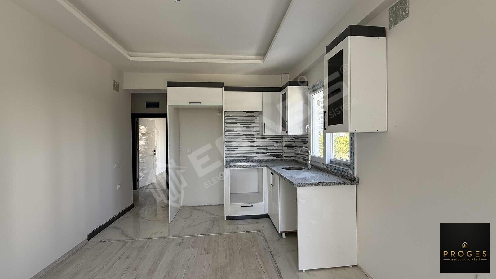 PROGES'TEN ARPAÇBAHŞİŞ'TE DENİZE YÜRÜME MESAFESİNDE 1+1 SATILIK - 7