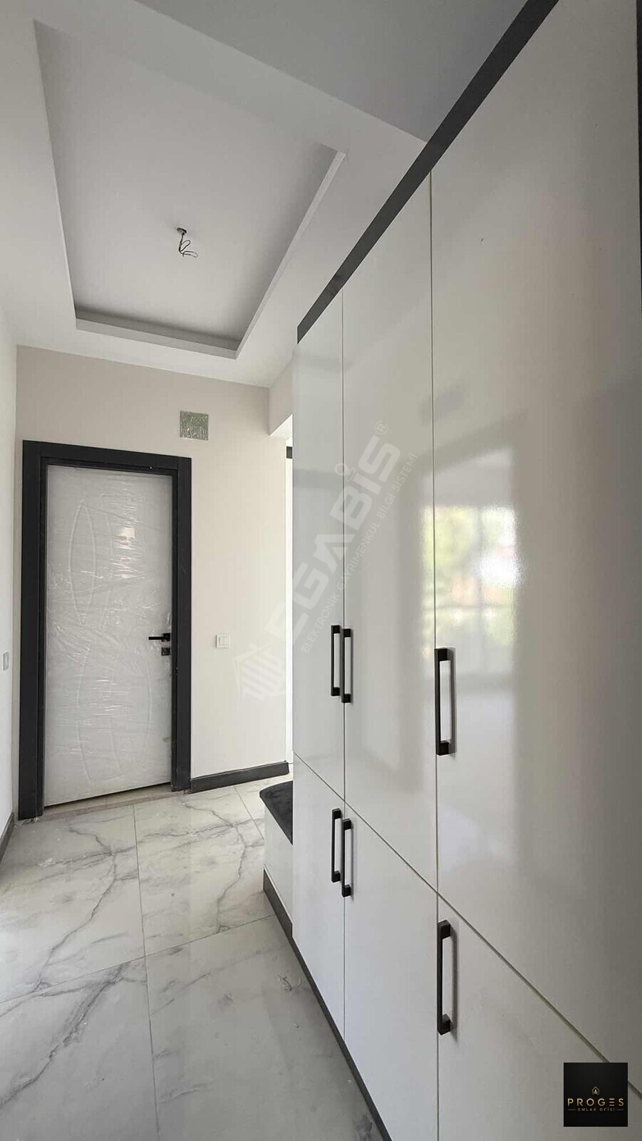 PROGES'TEN ARPAÇBAHŞİŞ'TE DENİZE YÜRÜME MESAFESİNDE 1+1 SATILIK - 22