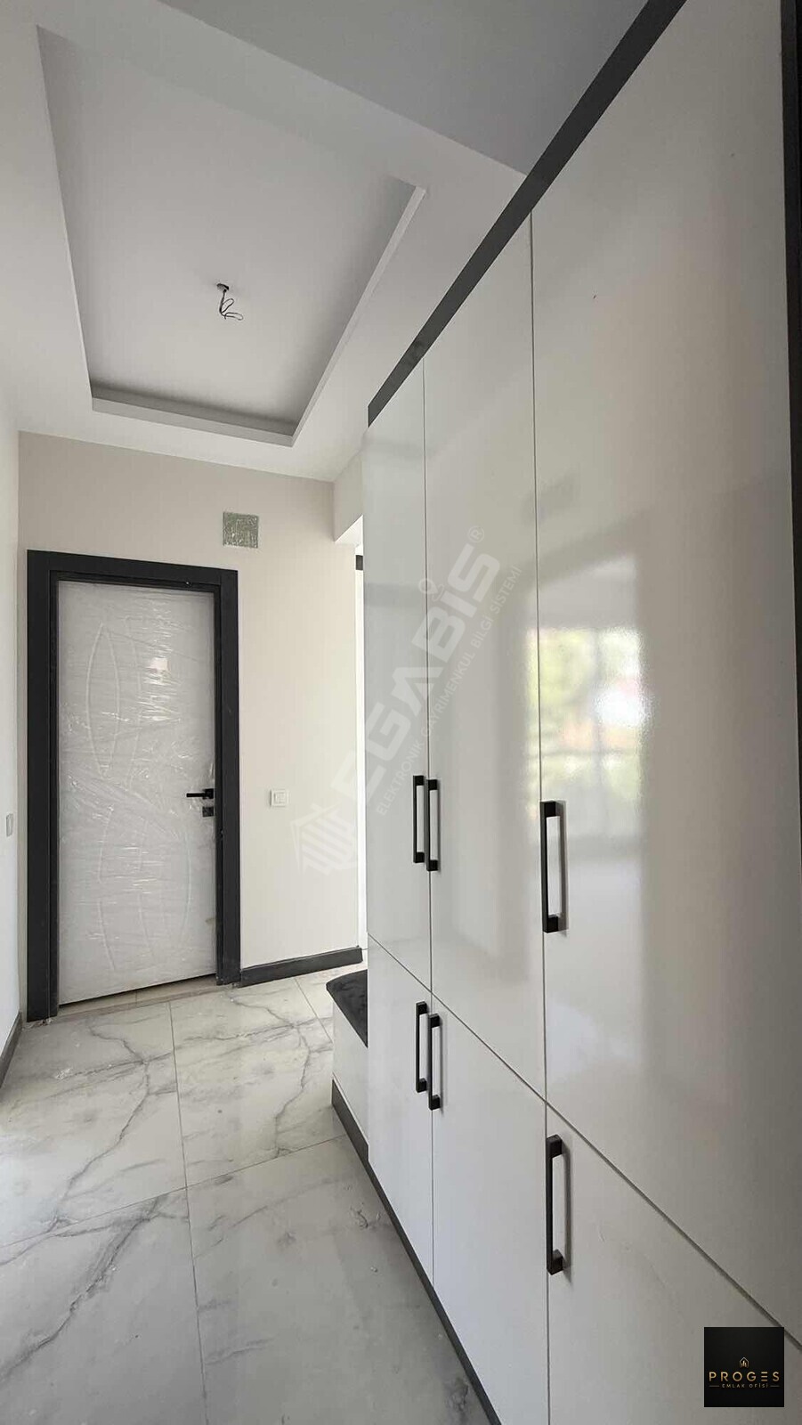 PROGES'TEN ARPAÇBAHŞİŞ'TE DENİZE YÜRÜME MESAFESİNDE 1+1 SATILIK - 23