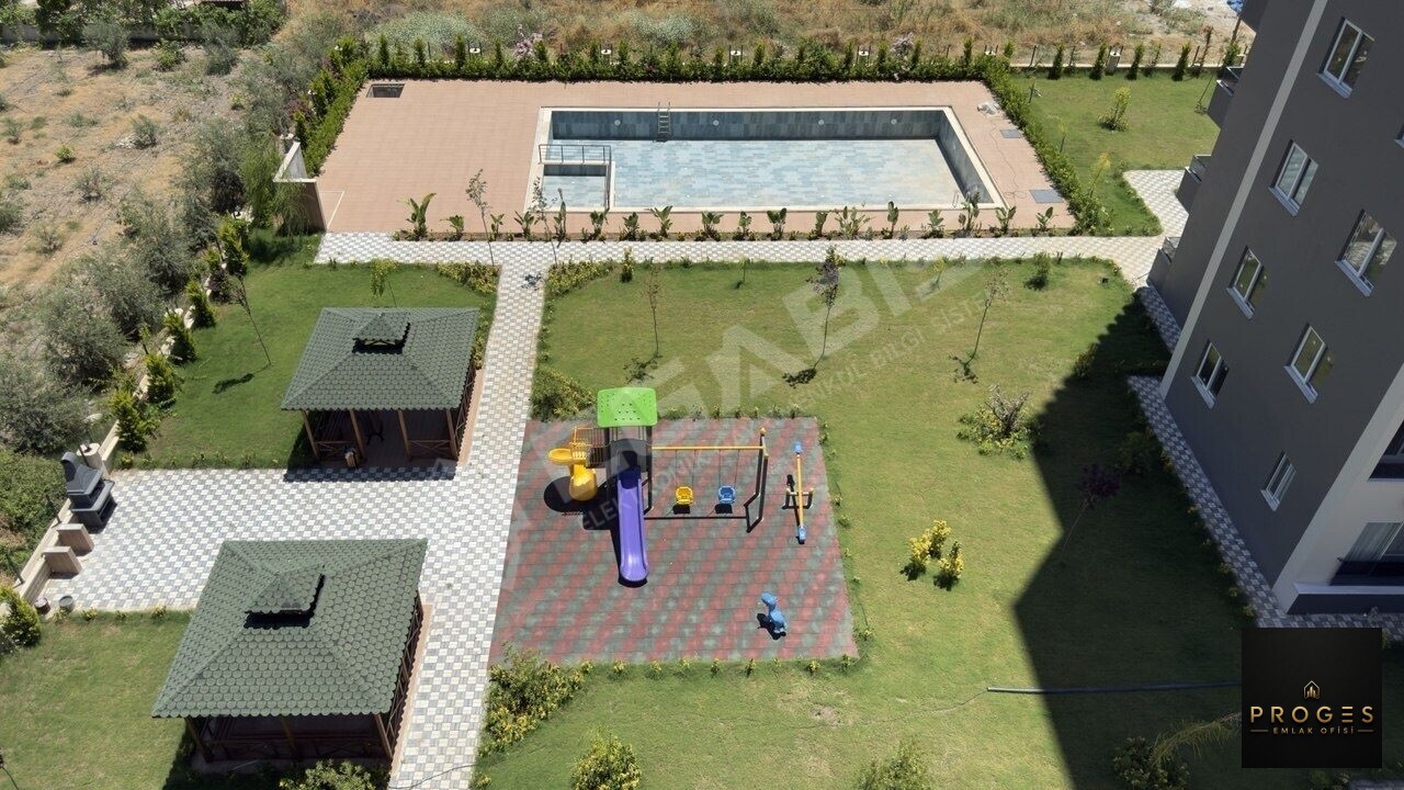 ERDEMLİ ARPAÇBAHŞİŞ MAHALLESİNDE SATILIK 1+1 KISMİ EŞYALI DAİRE
