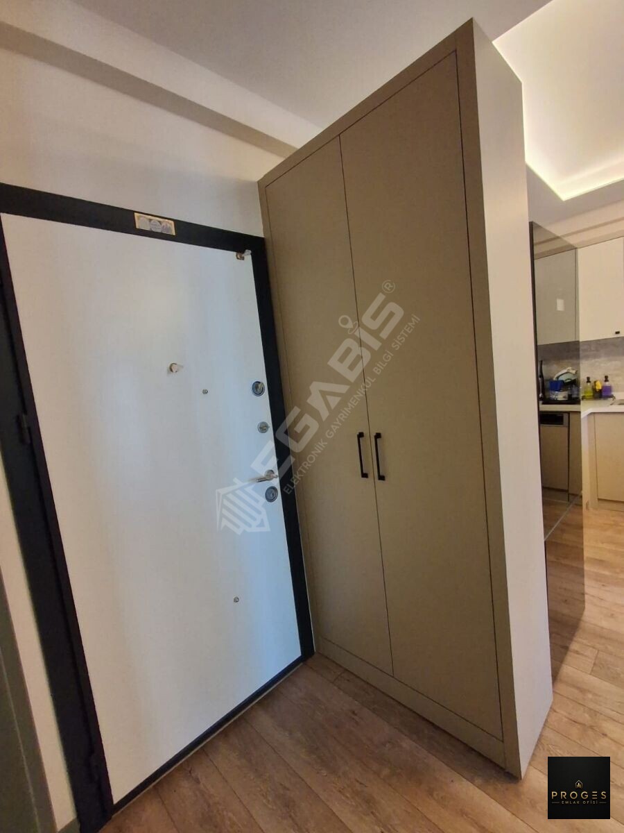 ERDEMLİ ARPAÇBAHŞİŞ MAHALLESİNDE SATILIK 1+1 KISMİ EŞYALI DAİRE - 26