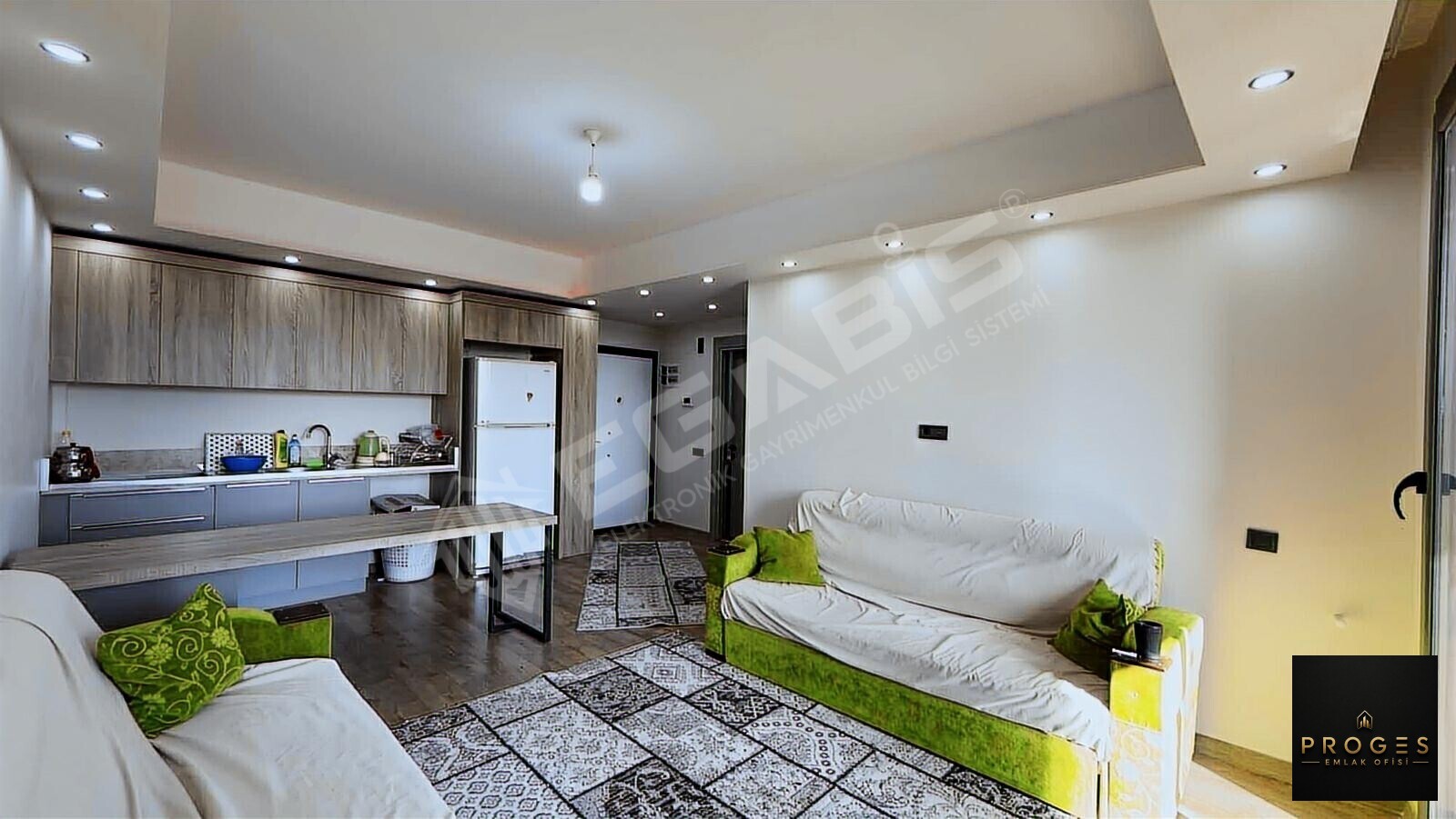 PROGES'TEN TÖMÜK'TE SOSYAL DONATLI 1+1 SATILIK DAİRE - 4