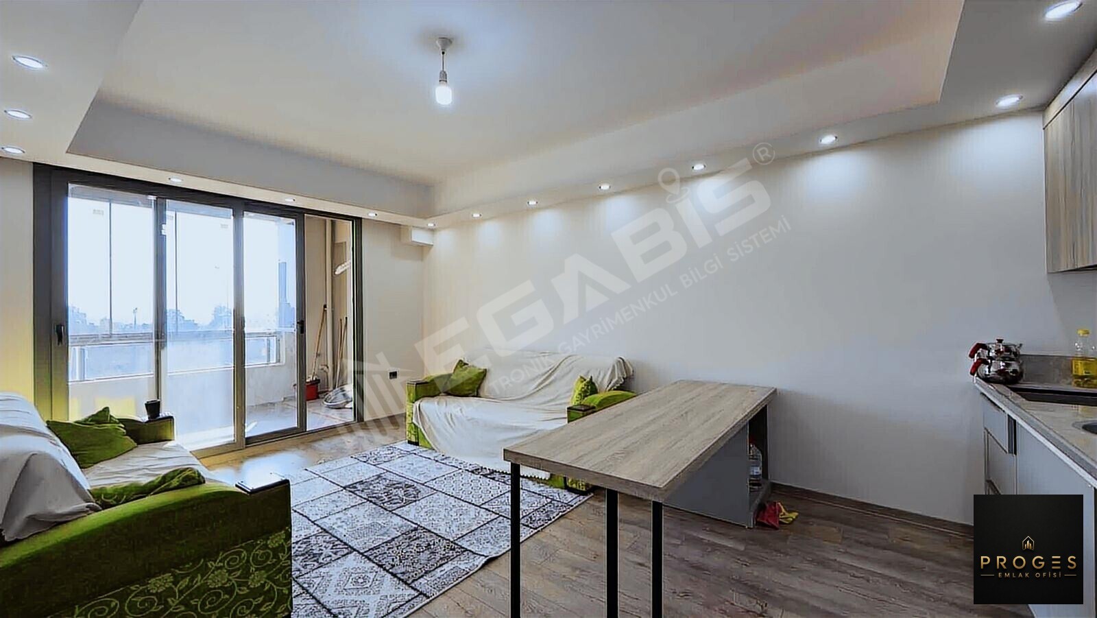 PROGES'TEN TÖMÜK'TE SOSYAL DONATLI 1+1 SATILIK DAİRE - 7