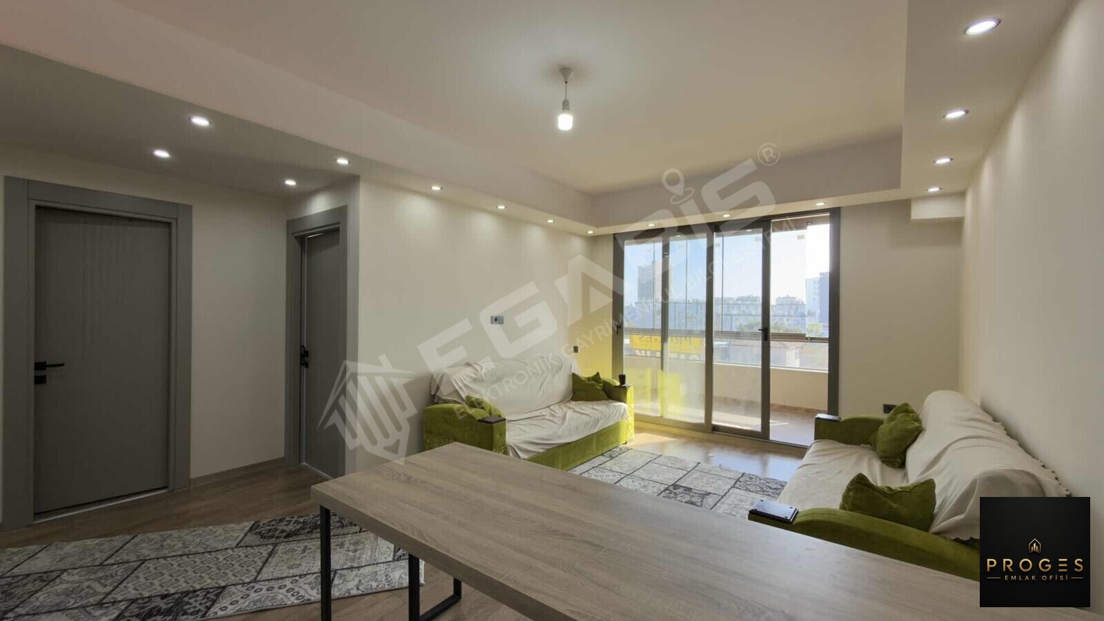 PROGES'TEN TÖMÜK'TE SOSYAL DONATLI 1+1 SATILIK DAİRE - 9