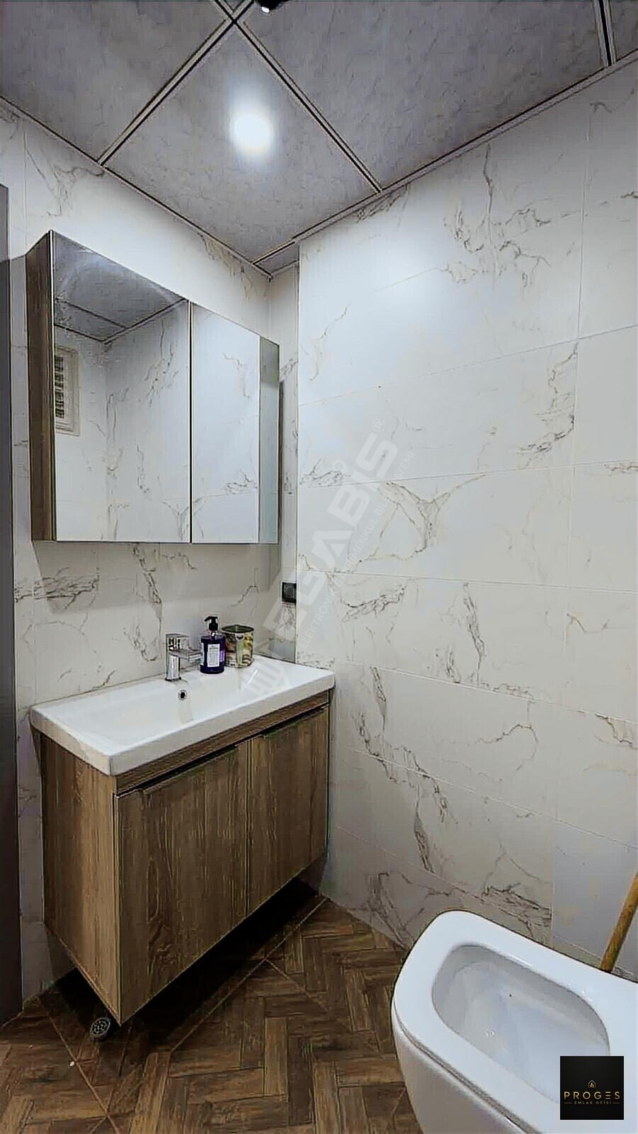PROGES'TEN TÖMÜK'TE SOSYAL DONATLI 1+1 SATILIK DAİRE - 12
