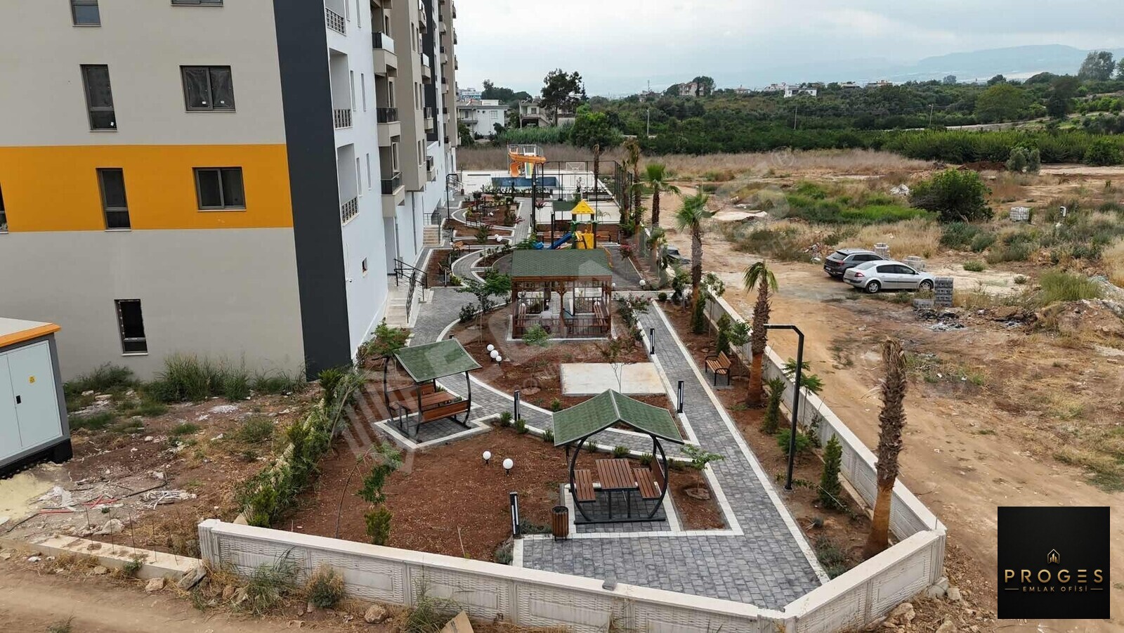 PROGES'TEN TÖMÜK'TE SOSYAL DONATLI 1+1 SATILIK DAİRE - 26
