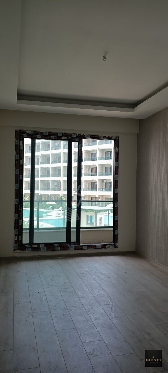 PROGES'TEN TATİL KÖYÜ TADINDA HAVUZ MANZARALI 1+1 SATILIK DAİRE - 5