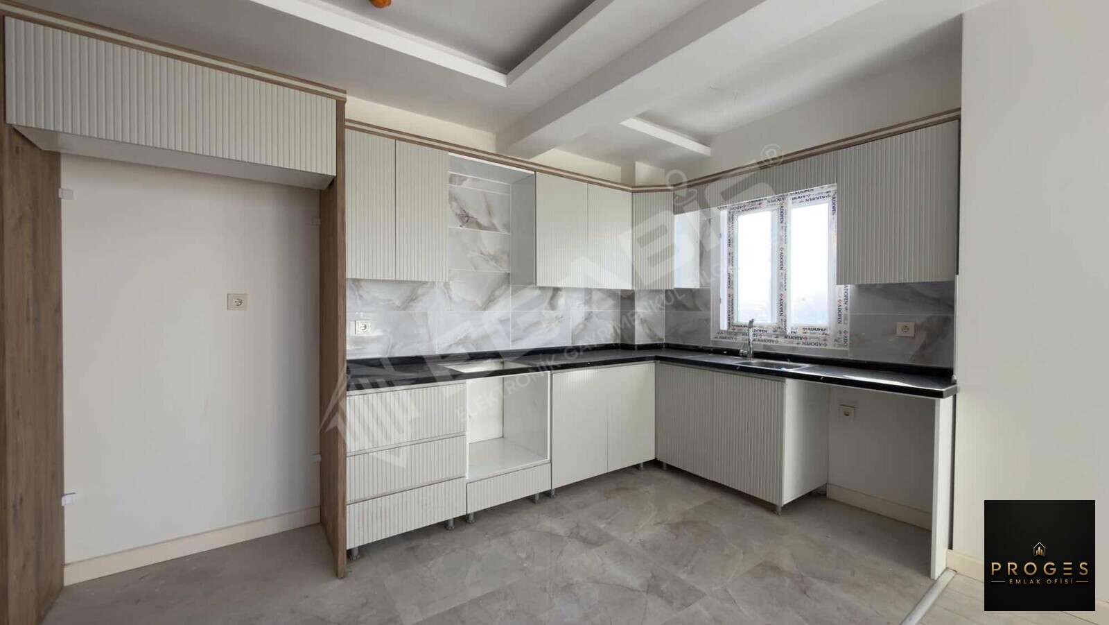 PROGES'TEN TÖMÜK'TE SOSYAL DONATLI 2+1 SATILIK DAİRE - 7