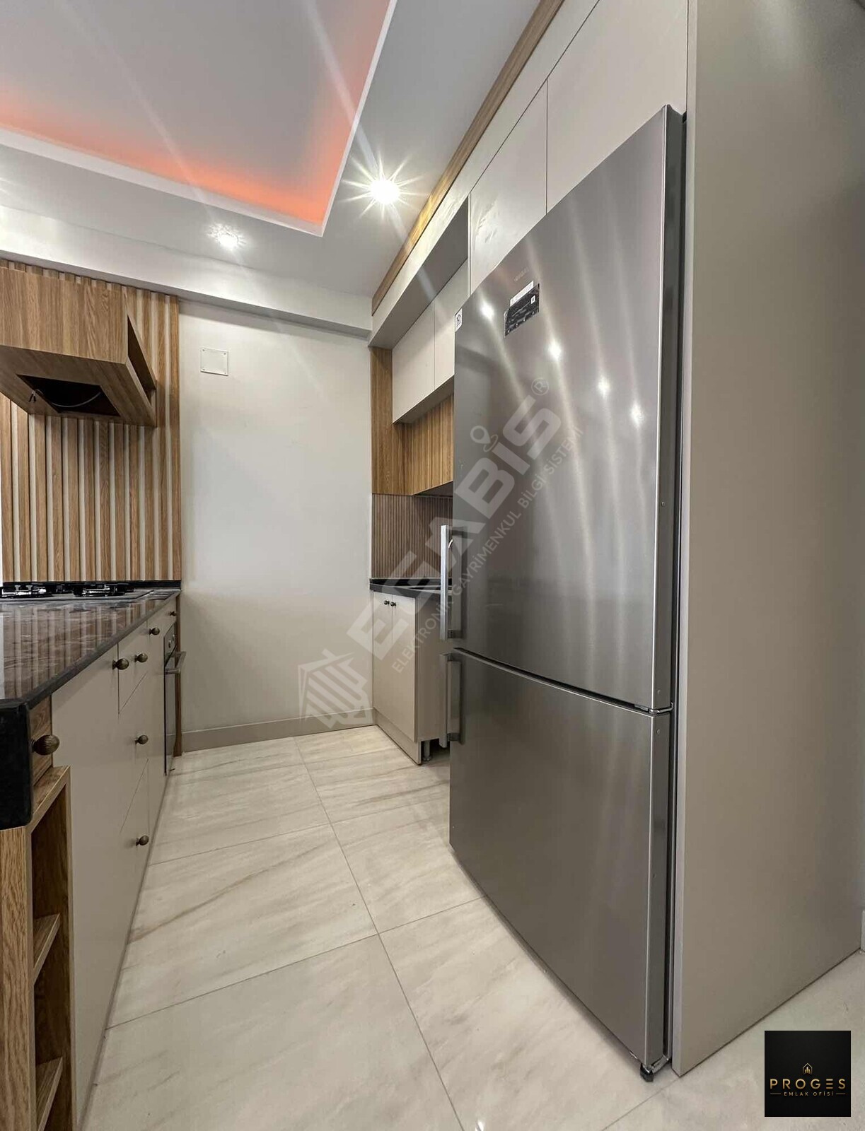PROGESTEN OTEL KONSEPTİNDE İSKANLI SATILIK 1+1 DAİRE - 11