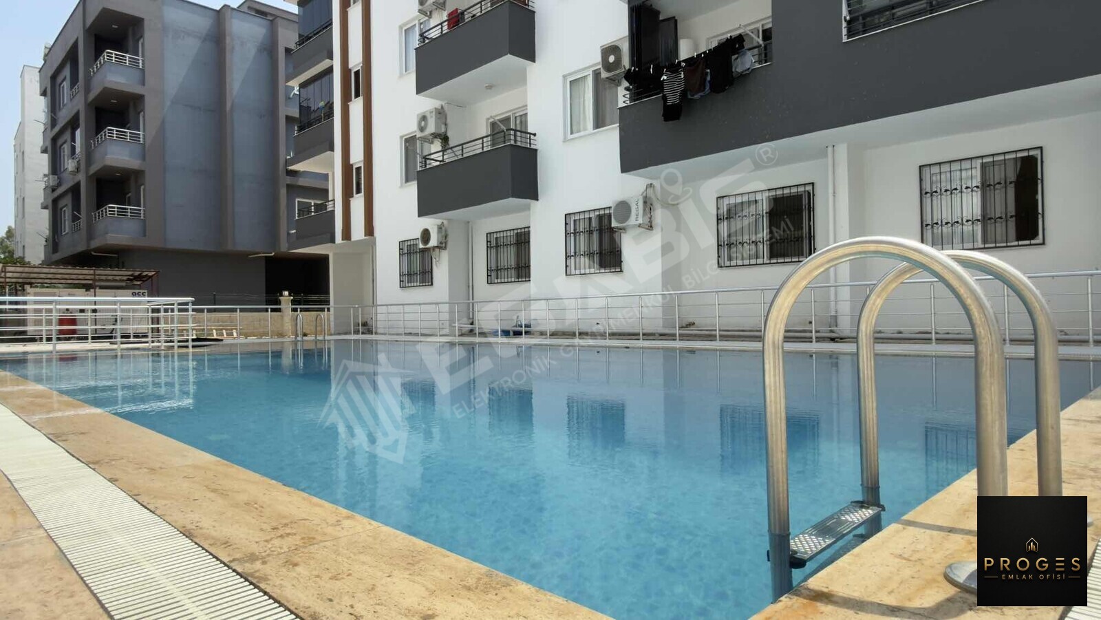PROGES'TEN KOCAHASANLI ' DA HAVUZLU SİTE 1+1 EŞYALI SATILIK