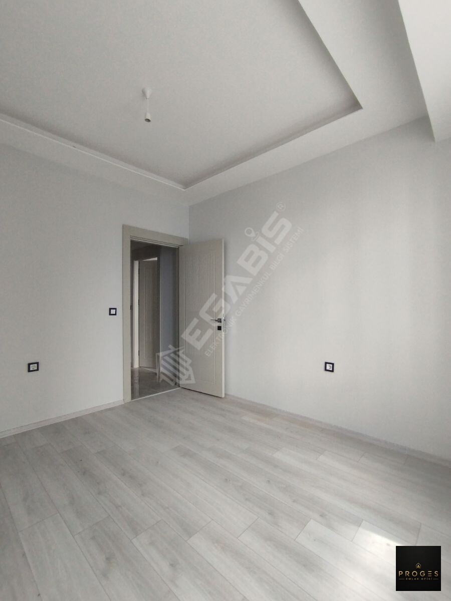 ERDEMLİ TÖMÜKTE HAVUZLU SİTEDE SATILIK 2+1 BAĞIMSIZ MUTFAK DAİRE - 14