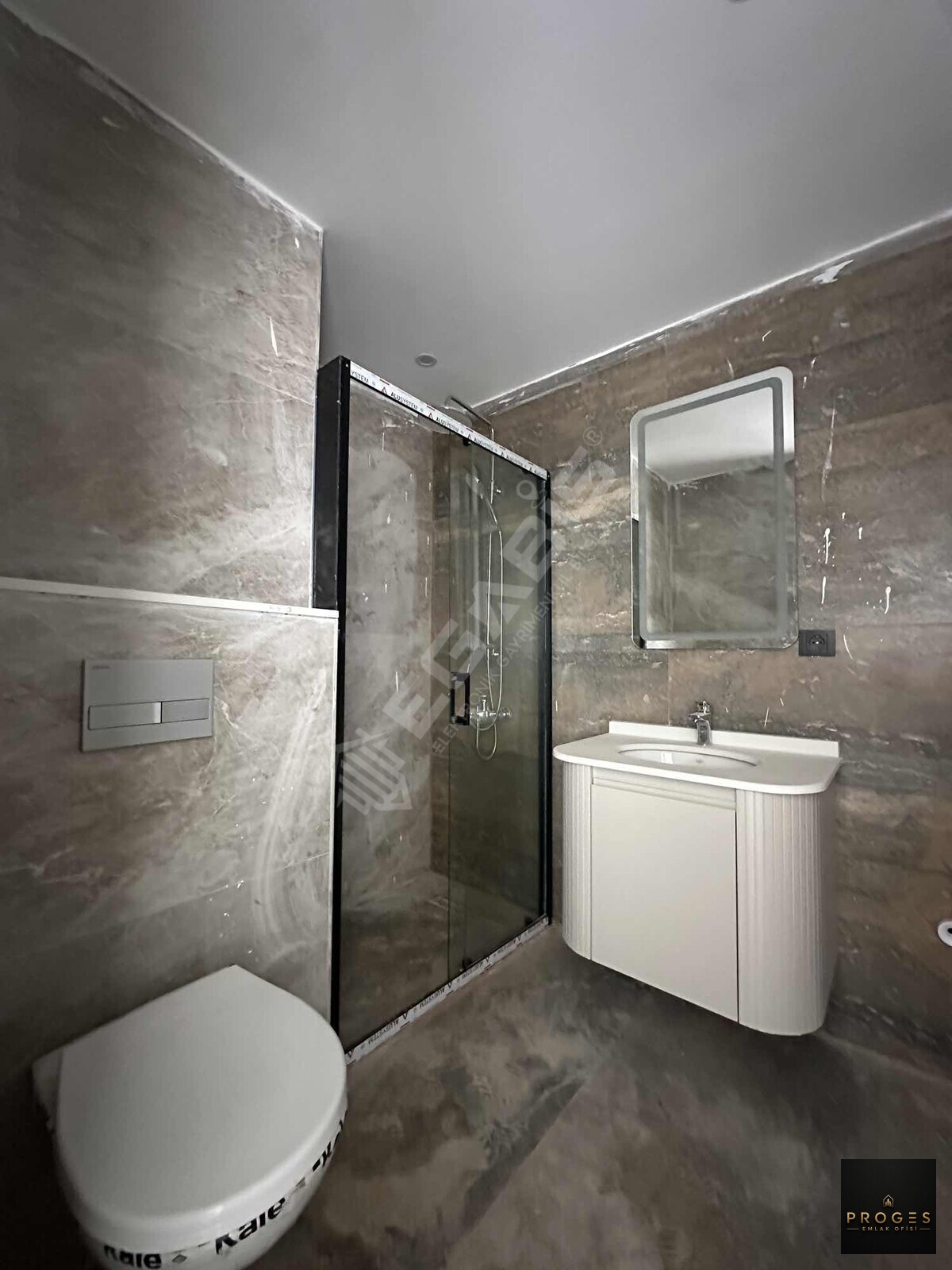 PROGES'TEN ÇEŞMELİ'DE DENİZ MANZARALI LÜKS KONSEPT SATILIK 1+1 - 12