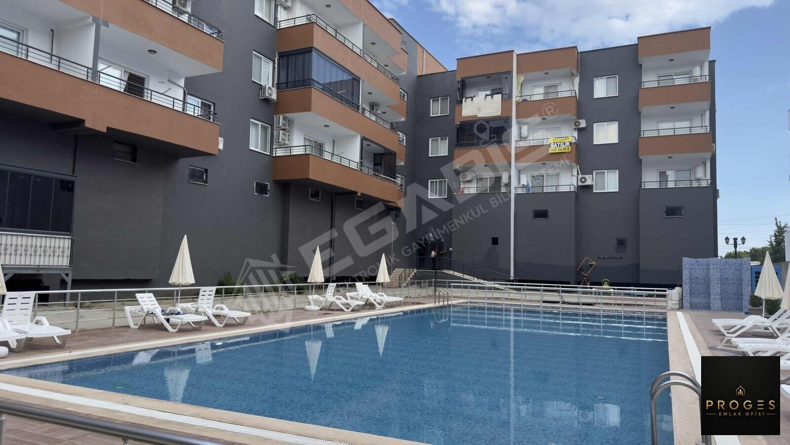 PROGES'TEN KOCAHASANLI'DA HAVUZLU KAT MÜLKİYETLİ EŞYALI 1+1