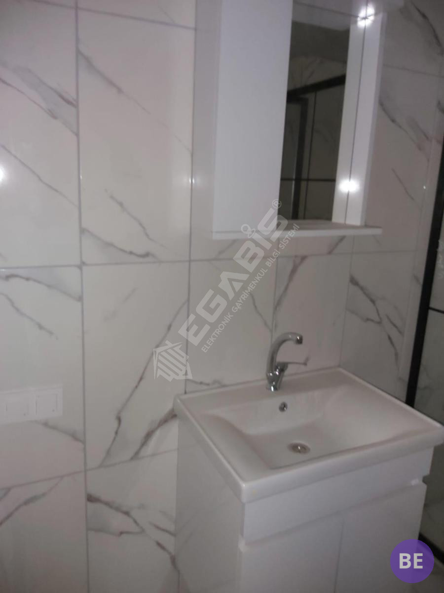 BULURUZDAN MERKEZİ KONUMDA SATILIK 1+1 - 14